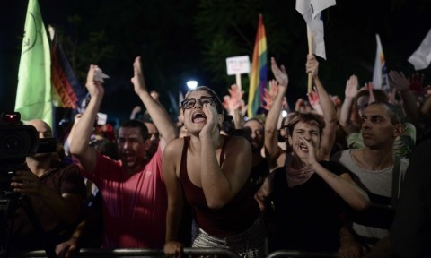 Thousands of Israelis attend an anti-violence and anti-homophobia rally in Tel Aviv. Photo: Tomer Neuberg/FLASh90