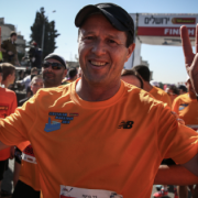 Mayor of Jerusalem, Nir Barkat, seen at the finish line of the Half Marathon run during the fourth international Jerusalem Marathon on March 21, 2014. Photo: Hadas Parush/ Flash90