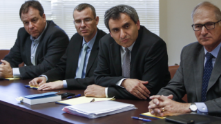 Likud party members Zeev Elkin (2R), Yariv Levin (2L) and attorney David Shomron meet with officials from the potential coalition parties as the coalition talks begin. Photo: Yonatan Sindel/Flash90