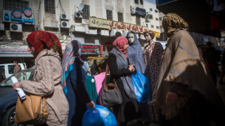 Palestinian women seen walking by mannequins in the center of the West Bank city of Ramallah, on February 14, 2015. Photo: Miriam Alster/Flash90