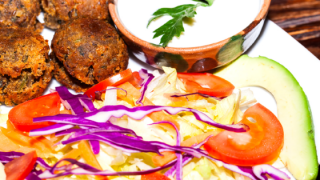 A typical Israel plate: falafel, tehina and veggies. Photo: Bigstock