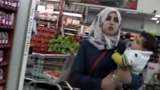 In hijab in an Israeli supermarket. Photo: From the video '10 Hours Walking in Israel as a Woman in Hijab.' YouTube/screenshot