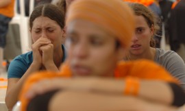 Settlers cry and pray during the disengagement in Gush Katif on August 18, 2005. Photo: Nati Shohat Flash90.