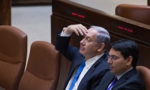Israeli Prime Minister Benjamin Netanyahu (L) and Minister of Space Danny Danon at a plenum session in the Knesset on June 17, 2015. Photo: Miriam Alster/FLASH90